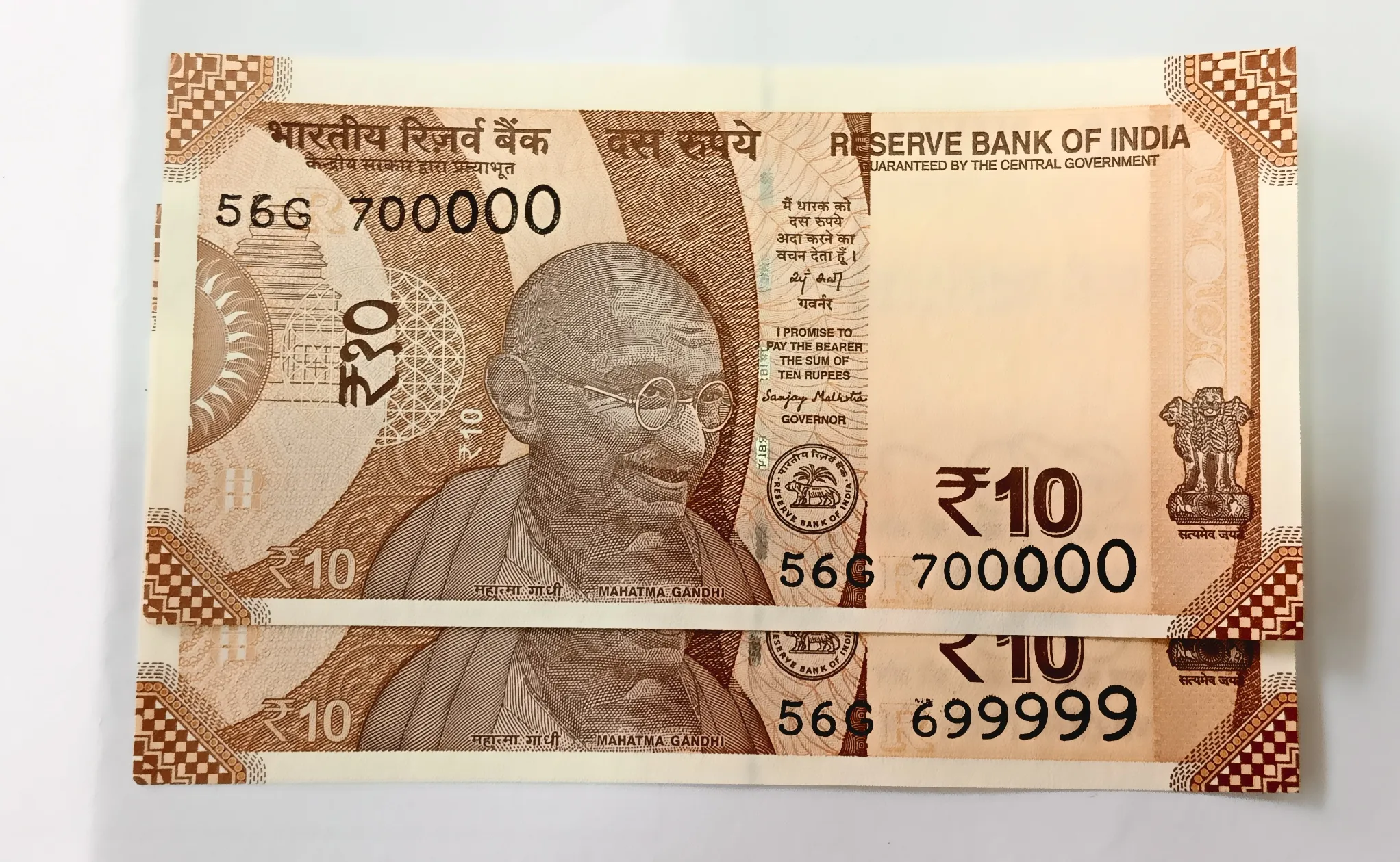 10 RUPEE FANCY NUMBER 2 NOTES 699999 AND 700000 GEM UNC GRADE