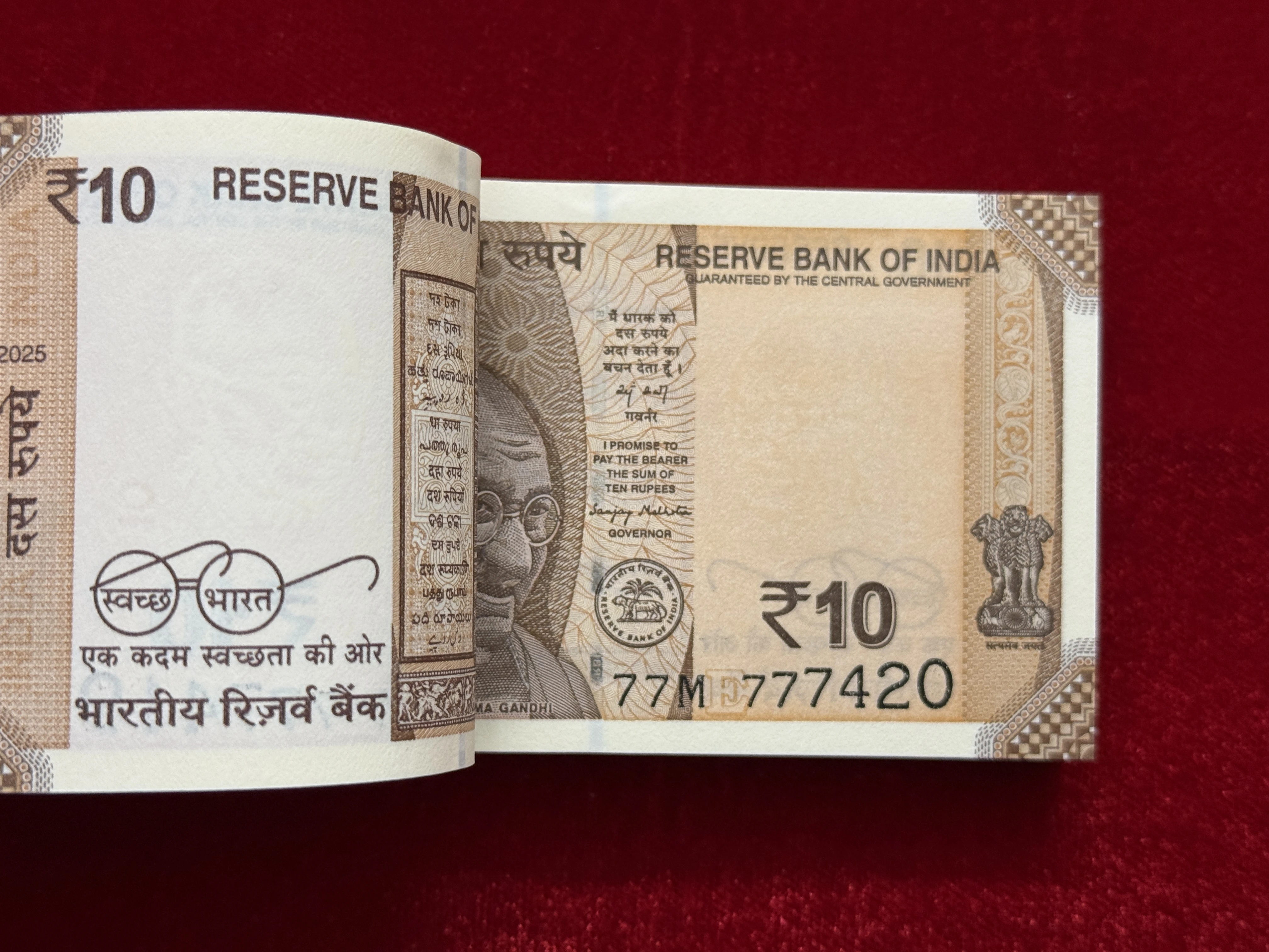 India, 2025 Rupees 10 Complete Serial Bundle of 100 Notes, Fancy Serial Number 777-420, Sign. Sanjay Malhotra, Inset E, UNC, (77M 777401)